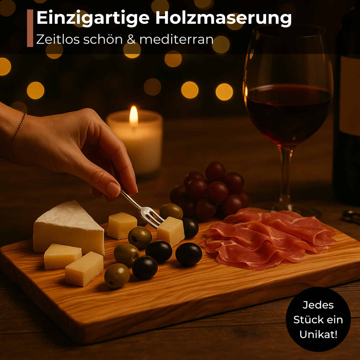 Holzbrett-auf-dem-Kaese-und-Schinken-serviert-wird